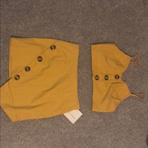 yellow two piece outfit